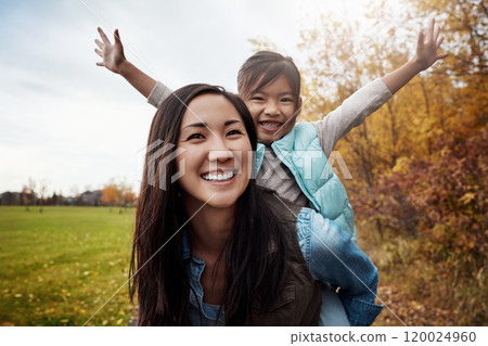 Portrait, Asian family and piggy back with smile, bonding together and countryside for adventure. Face, parent and girl with journey, outdoor and mother carrying kid, nature and holiday in Canada 120024960