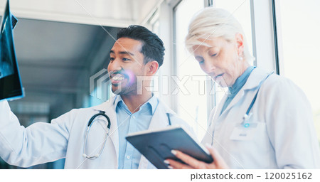 Doctors, x ray and medical analysis in hospital, professional consultation and teamwork collaboration for patient results. Mature radiologist, tablet and researching or diagnosis, people and wellness Doctors, x ray and medical analysis in hospital, professional consultation and teamwork collaboration for patient results. Mature radiologist, tablet and researching or diagnosis, people and wellness 120025162