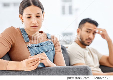 Sad, woman and hands with wedding ring on sofa for conflict, separation or marriage crisis in living room. Doubt, anxiety and disappointed wife with man for divorce, infidelity or breakup in home Sad, woman and hands with wedding ring on sofa for conflict, separation or marriage crisis in living room. Doubt, anxiety and disappointed wife with man for divorce, infidelity or breakup in home 120025378