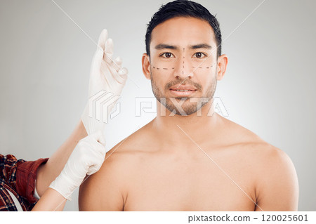 Plastic surgery, hands and drawing marks on face for man, rhinoplasty and cosmetic procedure in studio. Male person, surgeon and needle or syringe placement for facelift, nose job and blepharoplasty 120025601