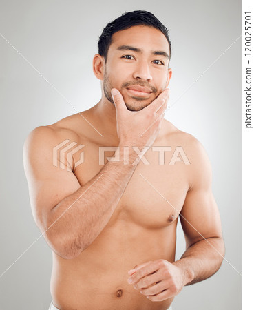 Skincare, hand and portrait of man in studio with morning routine for hygiene, wellness or natural treatment on white background. Grooming, body and model for confidence, happiness or satisfaction 120025701