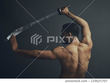 Man, back and samurai sword in studio for training, exercise and fitness with martial arts. Blade, wellness and ninja or warrior by black background for karate, fight and battle for dojo in Japan 120025707