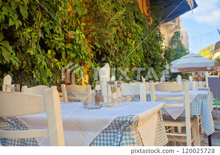Empty table outdoors. Athens, Greece Empty table outdoors. Athens, Greece 120025728