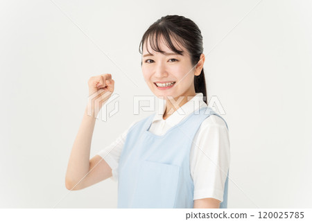 Apron woman, nursery teacher, caregiver, fist pump Apron woman, nursery teacher, caregiver, fist pump 120025785
