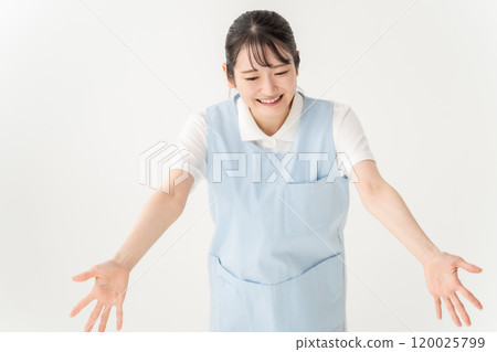 Apron woman, nursery teacher, caregiver, spreading hands 120025799