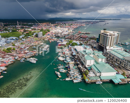 Aerial drone view of commercial pier and fisherman village at Semporna, Malaysia 120026400