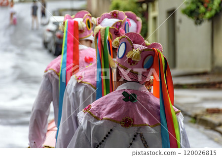 Group dressed in colorful and ornate clothing Group dressed in colorful and ornate clothing 120026815