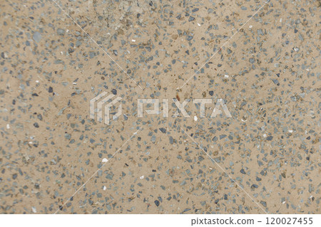 Close up view of small stones embedded in the cement Karlin, Prague 120027455