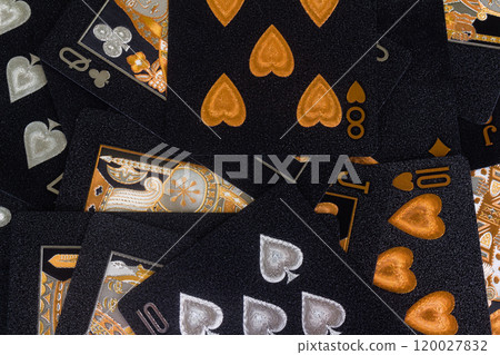 Deck of cards spread out pile gambling black gold Deck of cards spread out pile gambling black gold 120027832