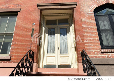 Brownstone entrance, facade of the building, staircase leading to the door, Manhattan, NYC, NY, USA Brownstone entrance, facade of the building, staircase leading to the door, Manhattan, NYC, NY, USA 120029278
