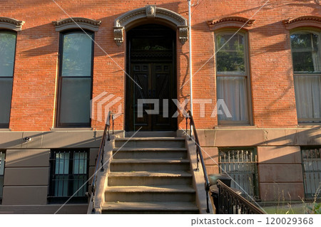 Brownstone entrance, facade of the building, staircase leading to the door, Manhattan, NYC, NY, USA Brownstone entrance, facade of the building, staircase leading to the door, Manhattan, NYC, NY, USA 120029368