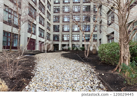 Path leading to the entrance to a modern apartment building, Manhattan, NYC, NY, USA 120029445