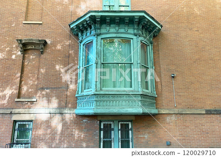 Facade of an old house with bay window, historical buildings, New Jersey, NJ, USA. The photograph showcases the charming facade of an old house in New Jersey, USA, featuring a prominent bay window Facade of an old house with bay window, historical buildings, New Jersey, NJ, USA. The photograph showcases the charming facade of an old house in New Jersey, USA, featuring a prominent bay window 120029710