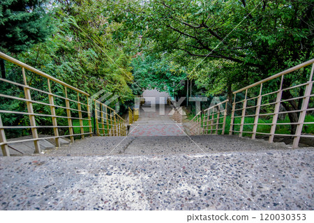 The old concrete stairs provide access to the beaches of Odessa.The old long stairs are still used to access the beaches of Odessa, some of them are partially repaired. 120030353