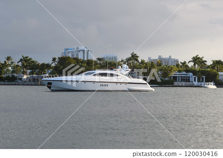 Luxury yacht and houses at the canal in Miami Beach 120030416