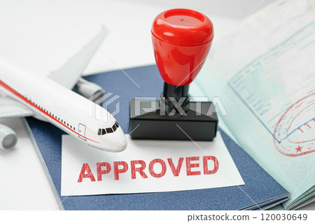 Visa and passport with approved stamp on document for tourism to immigration at airport in country. Visa and passport with approved stamp on document for tourism to immigration at airport in country. 120030649