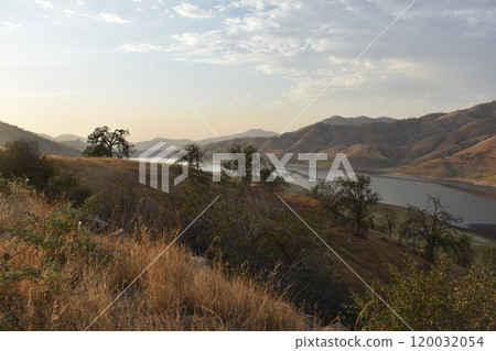 California hills background, view of mountains and river in the valley, natural landscape, wildlife at sunset, hills and plains 120032054