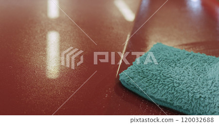 closeup of car paint deep cleaning with mitten closeup of car paint deep cleaning with mitten 120032688