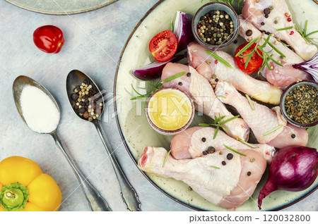 Group of raw chicken legs. 120032800