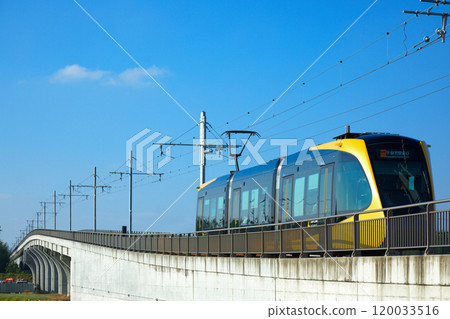 Light line departing from Tobiyama Castle Ruins Station and blue sky - Utsunomiya Light Rail Light line departing from Tobiyama Castle Ruins Station and blue sky - Utsunomiya Light Rail 120033516