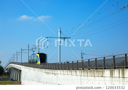 Light line departing from Tobiyama Castle Ruins Station and blue sky - Utsunomiya Light Rail 120033532