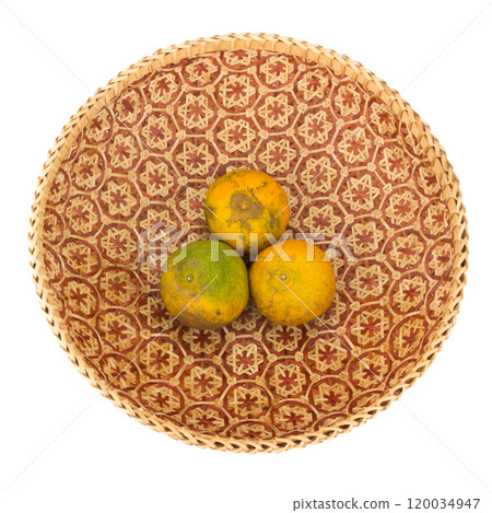 tangerine in wicker baskets isolated on white background tangerine in wicker baskets isolated on white background 120034947