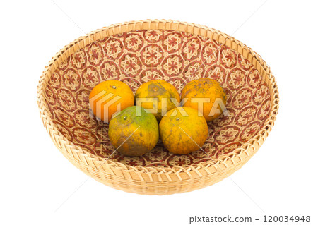 tangerine in wicker baskets isolated on white background tangerine in wicker baskets isolated on white background 120034948