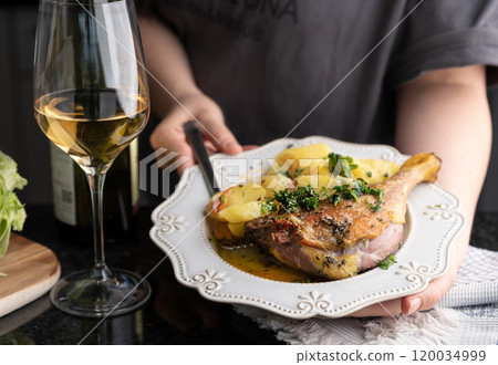 Roasted Duck Leg with Herbs and White Wine Gourmet Dining Experience. Succulent roasted duck leg 120034999