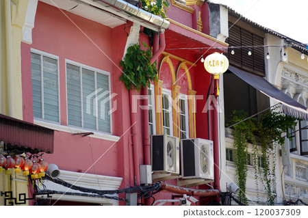 Detailed view of windows, doors and balconies of city buildings  120037309