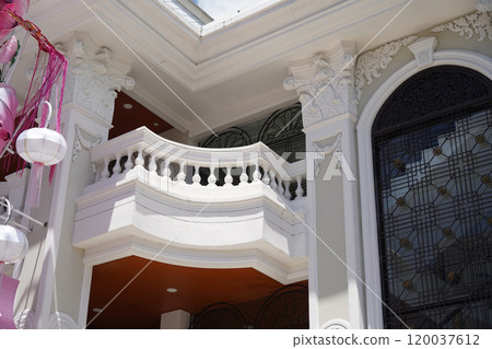 Detailed view of windows, doors and balconies of city buildings  120037612