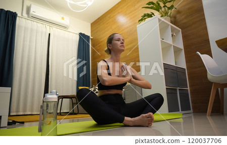 A young woman have a joyfully yoga practice  120037706
