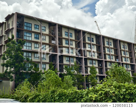 Detailed view of windows, doors and balconies of city buildings  120038113