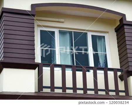 Detailed view of windows, doors and balconies of city buildings Detailed view of windows, doors and balconies of city buildings 120038234