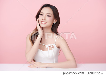 Beautiful young asian woman with clean fresh skin on pink background, Face care, Facial treatment, Cosmetology, beauty and spa, Asian women portrait. 120042232