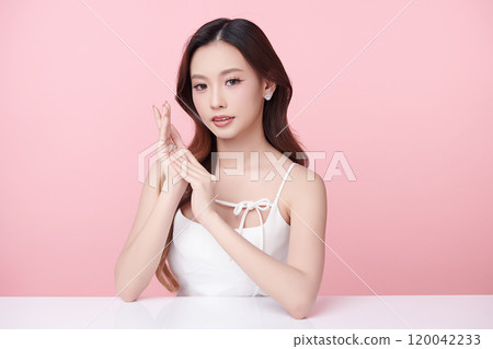 Beautiful young asian woman with clean fresh skin on pink background, Face care, Facial treatment, Cosmetology, beauty and spa, Asian women portrait. 120042233