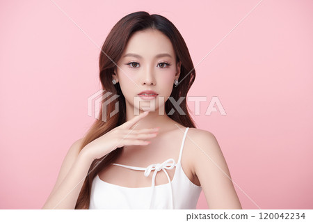 Beautiful young asian woman with clean fresh skin on pink background, Face care, Facial treatment, Cosmetology, beauty and spa, Asian women portrait. 120042234