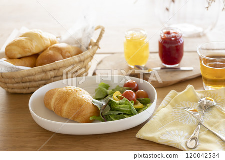 Breakfast: Bread and salad on the table Breakfast: Bread and salad on the table 120042584
