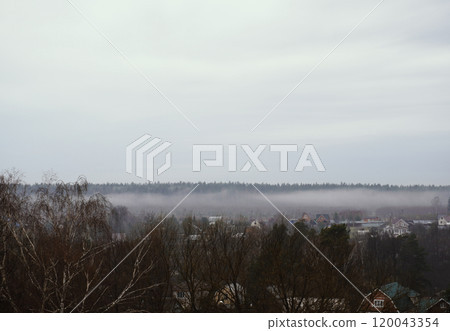 White fog spreads across the valley. White fog spreads across the valley. 120043354
