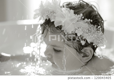 Subject for spiritual initiation: baby baptism in church, newborn christening , significant catholic ritual representing communion with divine, traditional religious practices, Christian sacraments. 120043405