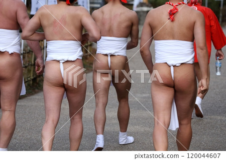 Men wearing loincloths, festival scene Men wearing loincloths, festival scene 120044607
