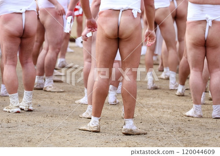 Men wearing loincloths, festival scene Men wearing loincloths, festival scene 120044609