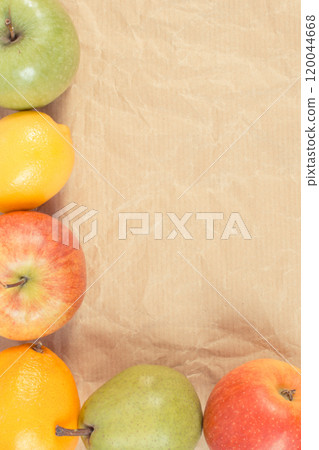 Ripe fruits on old paper. Healthy lifestyle. Fruits as source minerals and vitamins. Place for text 120044668