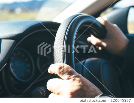 A man driving 120045597