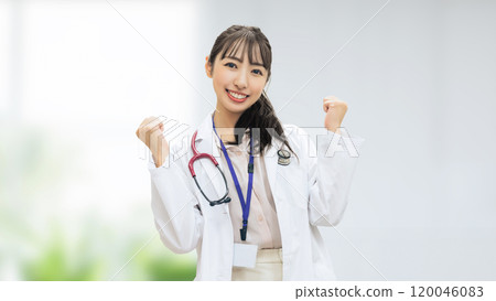 Female medical staff doing a fist pump Female medical staff doing a fist pump 120046083