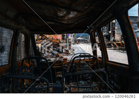2024 Noto Peninsula earthquake: Destroyed town and burnt out car 120046261