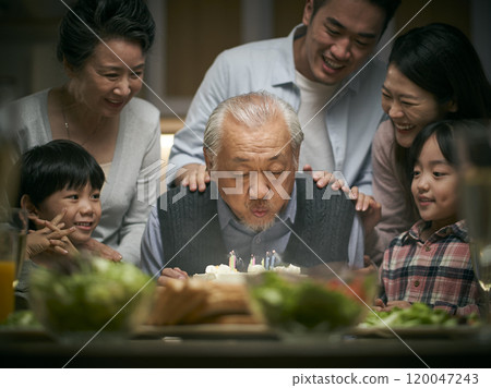 three generation asian family celebrating grandpa's birthday at home three generation asian family celebrating grandpa's birthday at home 120047243