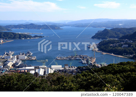 A view of downtown Sasebo from the popular viewing spot "Yumiharidake Observatory" in Sasebo City 120047389