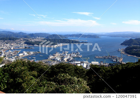 A view of downtown Sasebo from the popular viewing spot "Yumiharidake Observatory" in Sasebo City 120047391