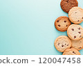 Top view of chocolate chip cookies on a solid background. 120047458