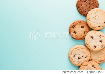 Top view of chocolate chip cookies on a solid background. Top view of chocolate chip cookies on a solid background. 120047458